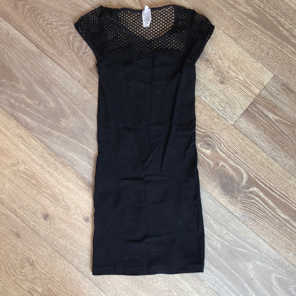 Black mini dress with fishnet top